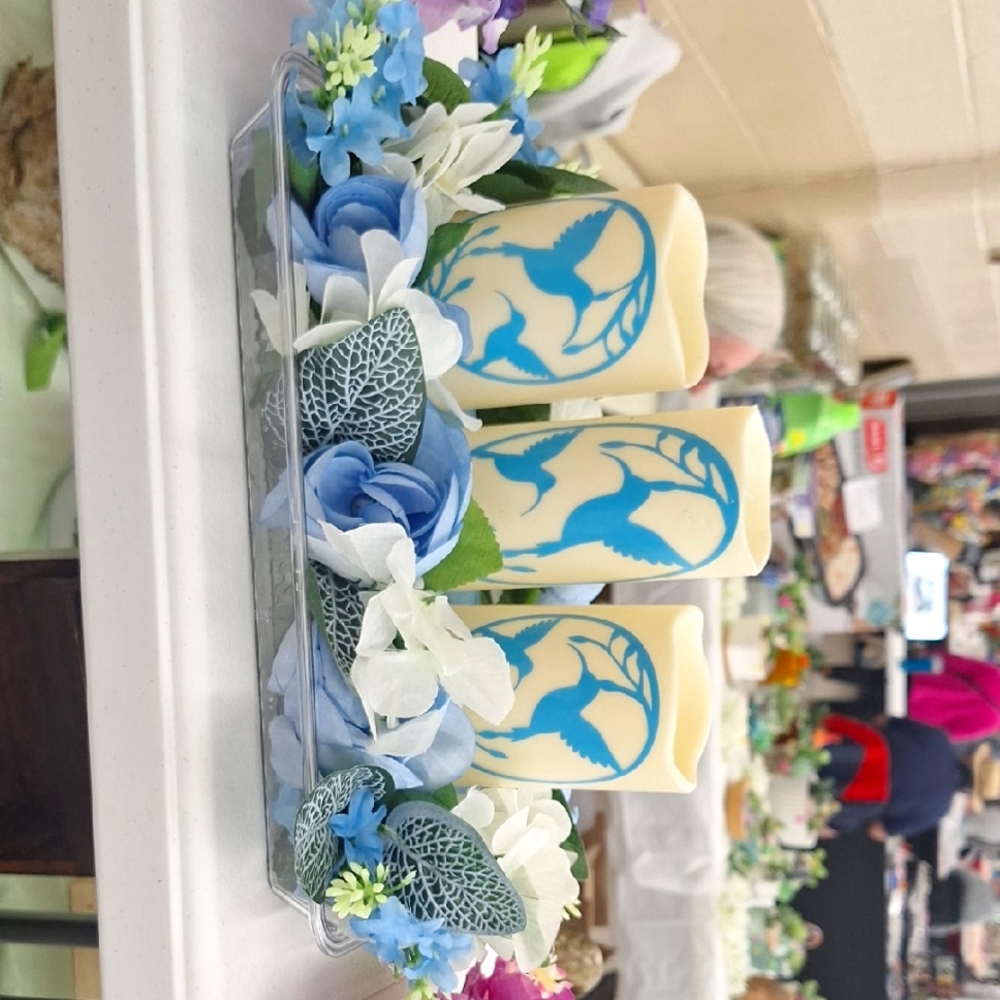 Decorative Cream and Blue Candles with Floral Accents